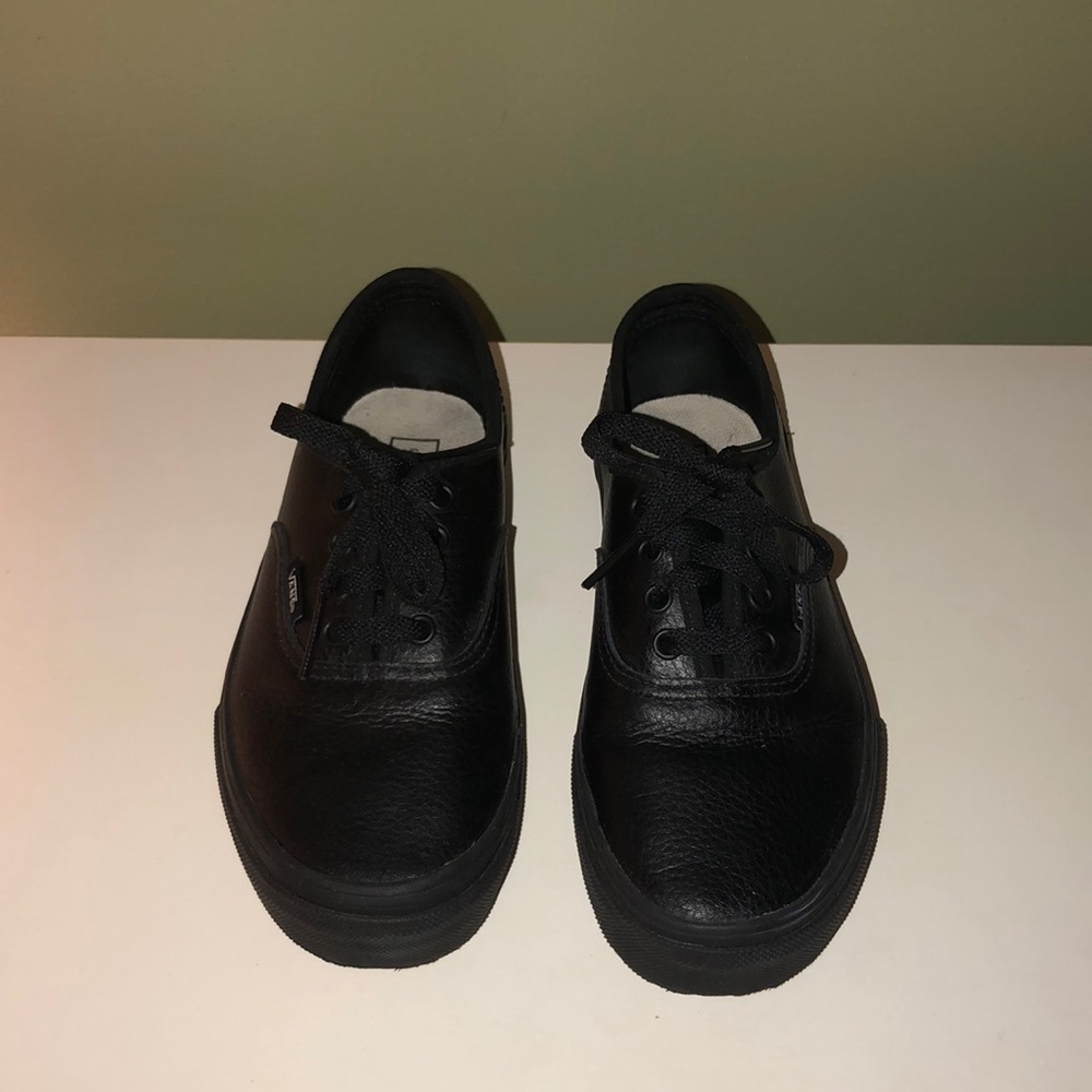Black leather vans